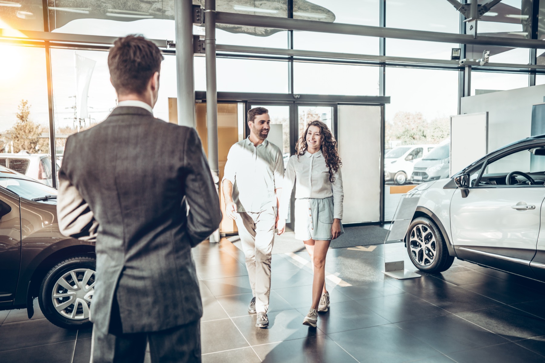 Customers visiting the dealership lot